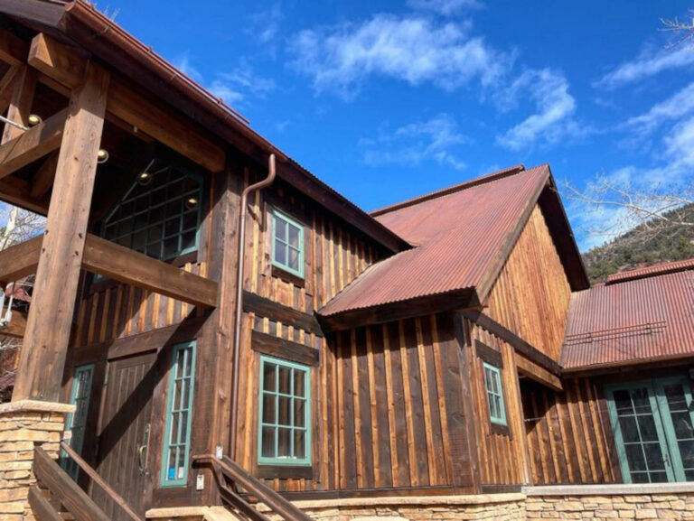 Outside view of wooden hostel in Telluride, CO.