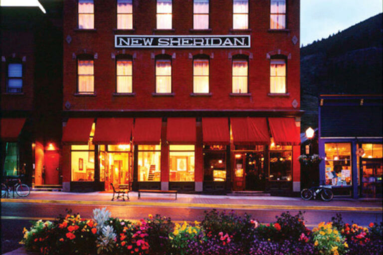 Street view of New Sheridan Hotel at night
