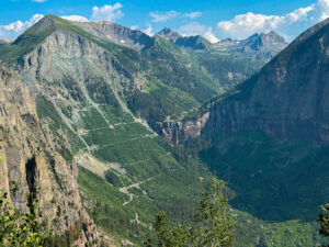 View of the Black Bear Pass switchbacks down the mountain into Telluride, seen from Imogen Pass
