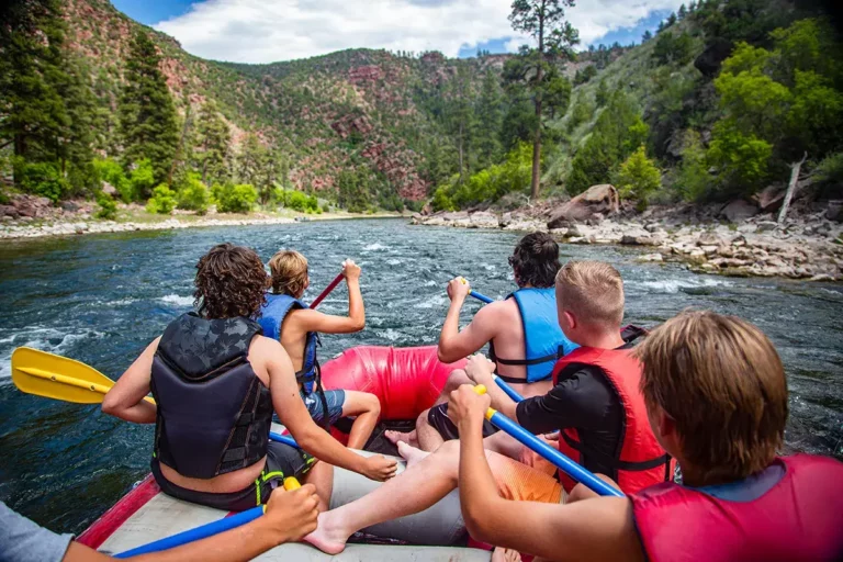 A group on a river rafting trip. Outdoor adventures benefit youth
